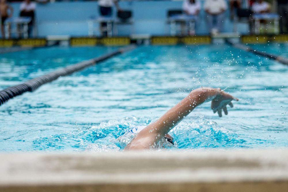 Free person in swimming race image, public domain sport CC0 photo.