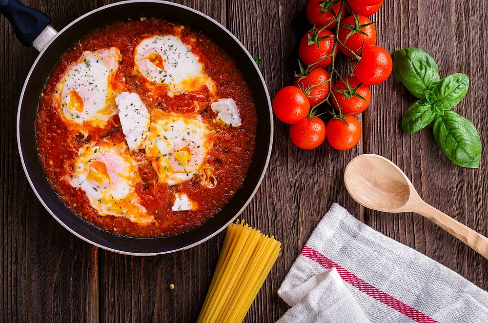 Free pouched egg in spicy tomato sauce image, public domain food CC0 photo.