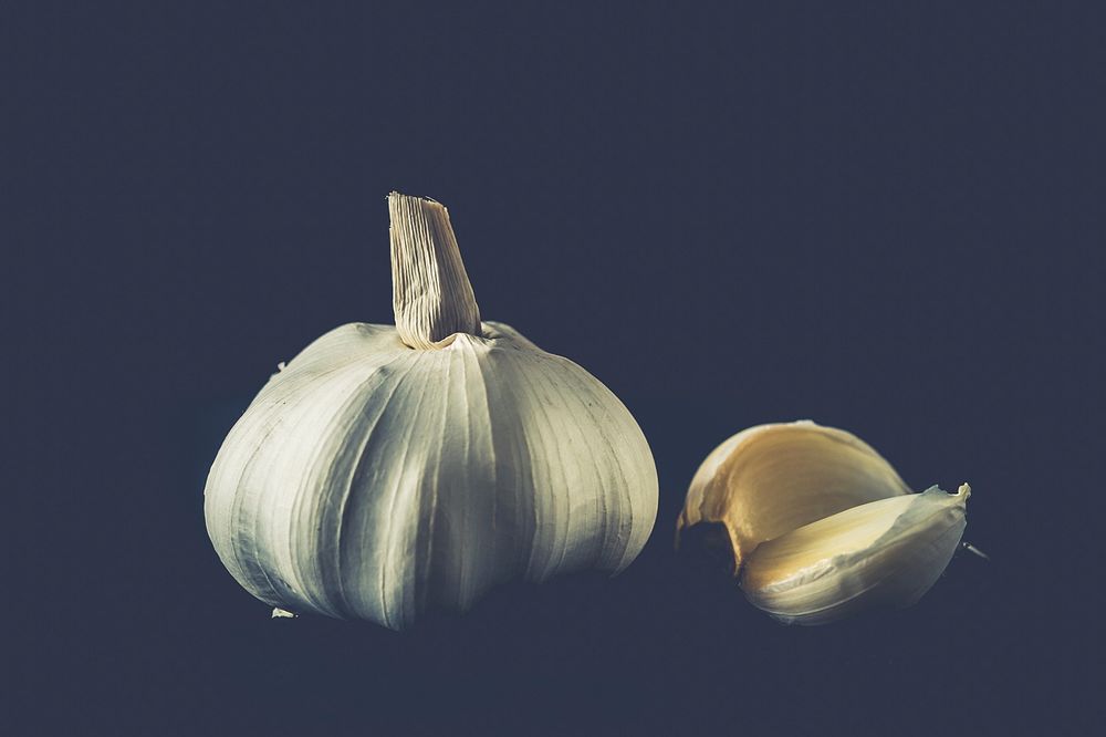 Free garlic with black background image, public domain food CC0 photo.
