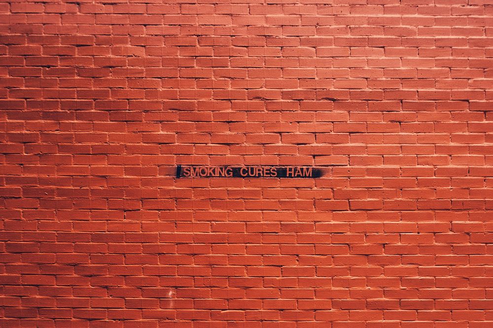 Free brick wall with smoking sign image, public domain CC0 photo.