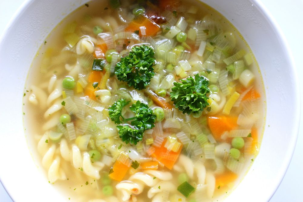 Free clear vegetable soup bowl, pasta photo, public domain food CC0 image.