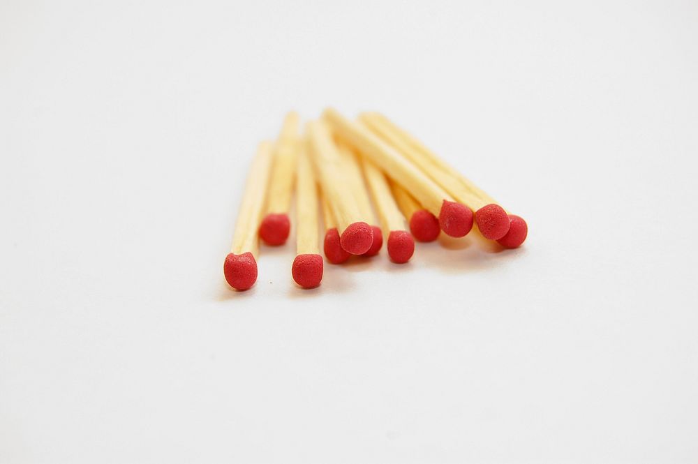 Free wooden matches image, public domain white background CC0 photo.