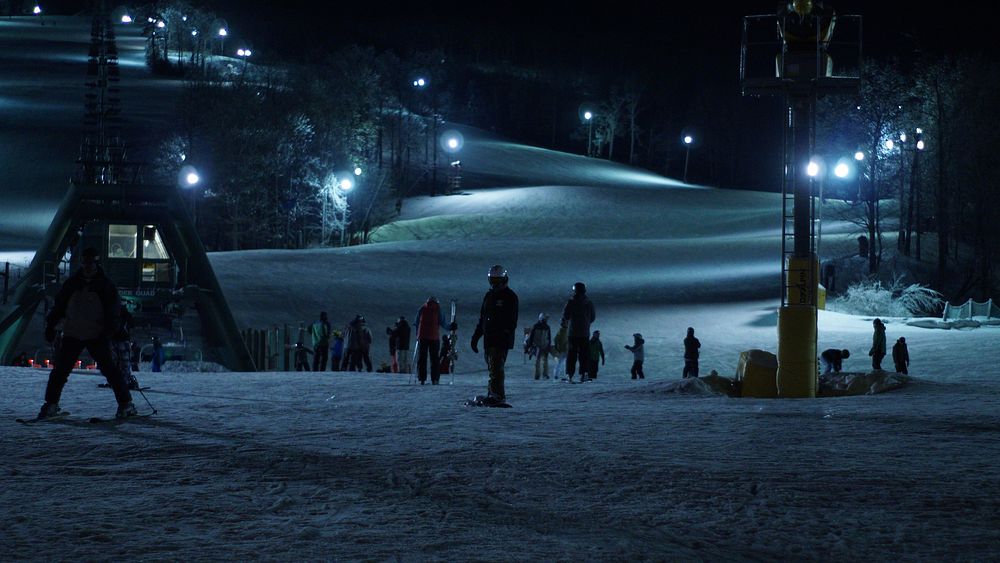 Free people skiing during night image, public domain sport CC0 photo.