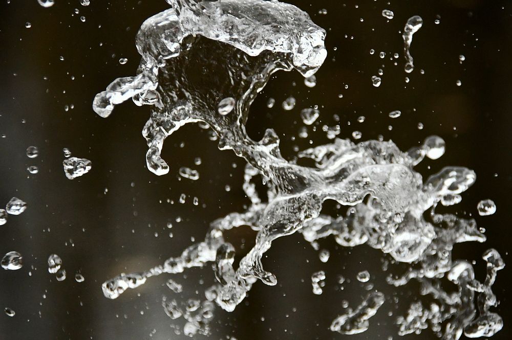 Splashing water background, free public domain CC0 photo.