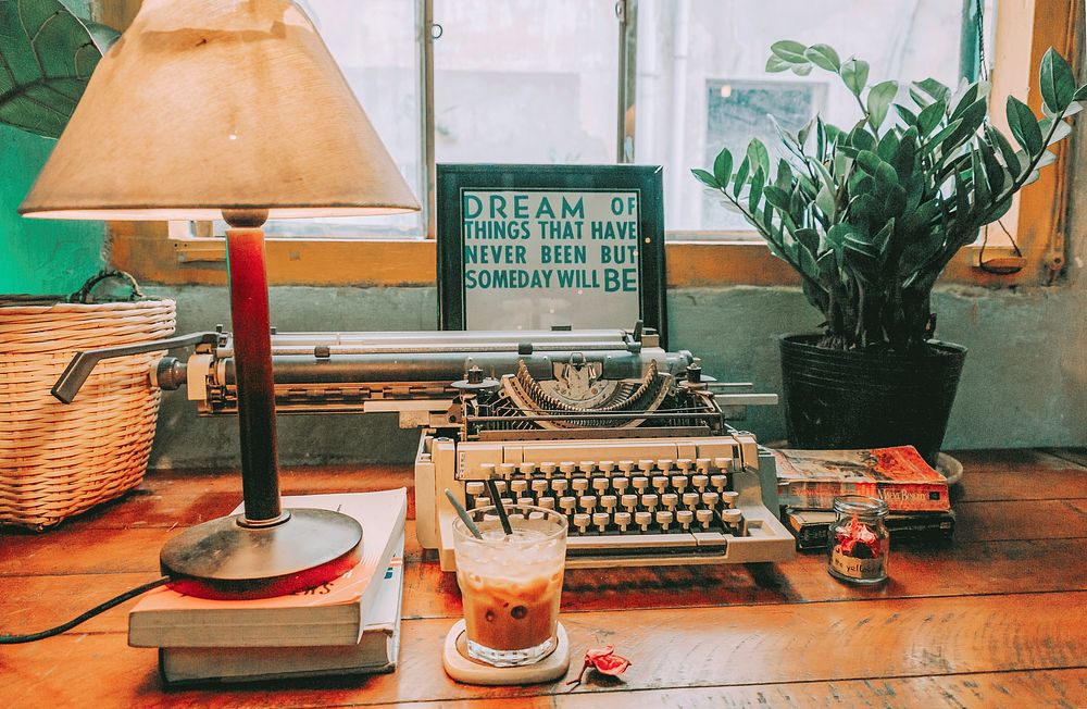 Free retro theme typewriter working desk public domain CC0 photo.