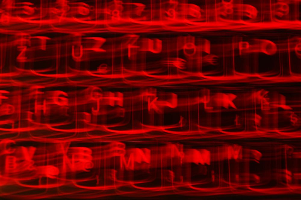 Free blurry red keyboard image, public domain CC0 photo.