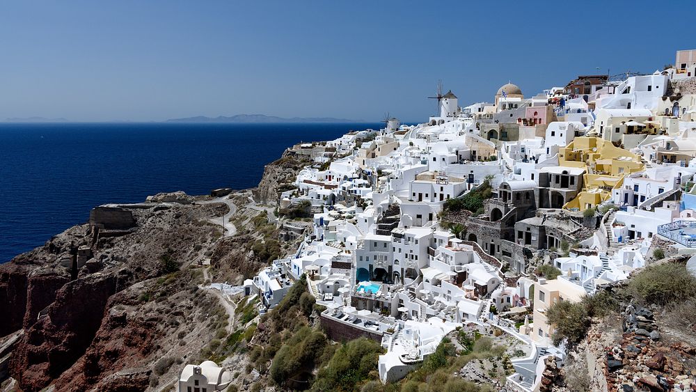 Santorini aerial view, coastal edge landscape, free public domain CC0 photo.