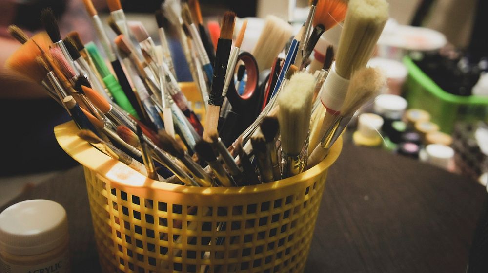 Art supplies in a basket, free public domain CC0 image.