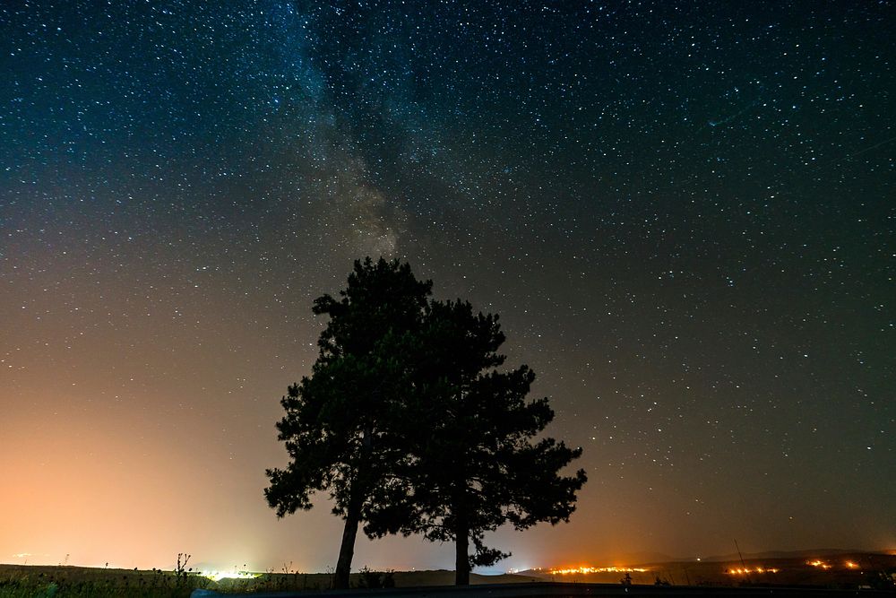 Starry night sky countryside photography, free public domain CC0 image.