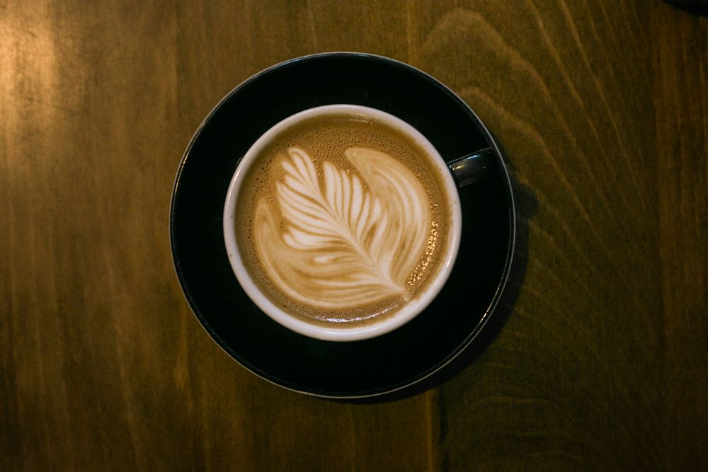 Free flat lay latte coffee photo, public domain drink CC0 image.