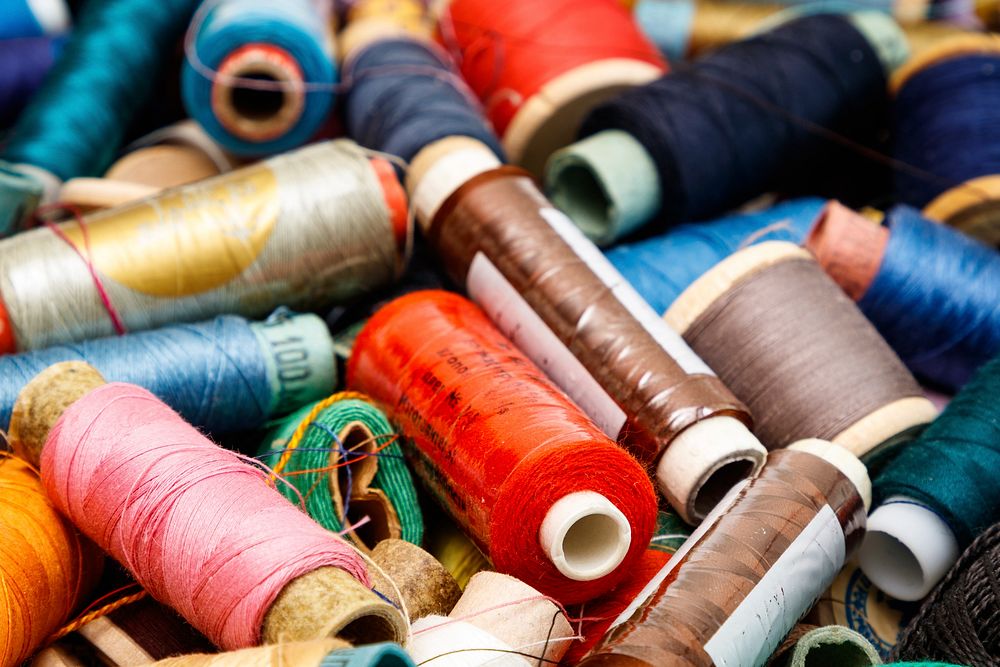 Free colorful sewing thread spools photo, public domain CC0 image.