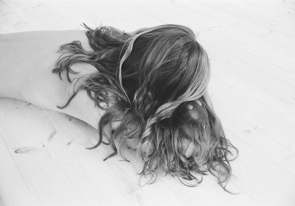 Free curly sprawled hair image, public domain lady CC0 photo.
