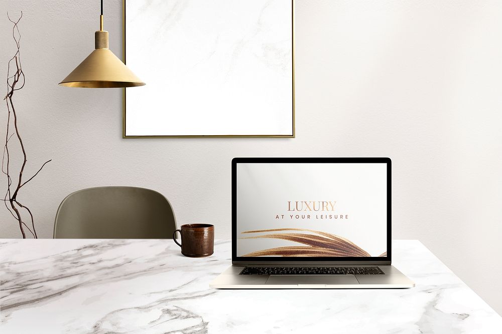 Laptop screen mockup psd on a desk luxury home office zone design