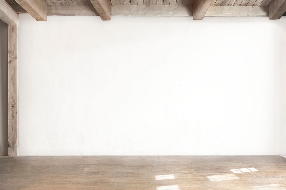 Empty minimal room with natural light on wooden floor