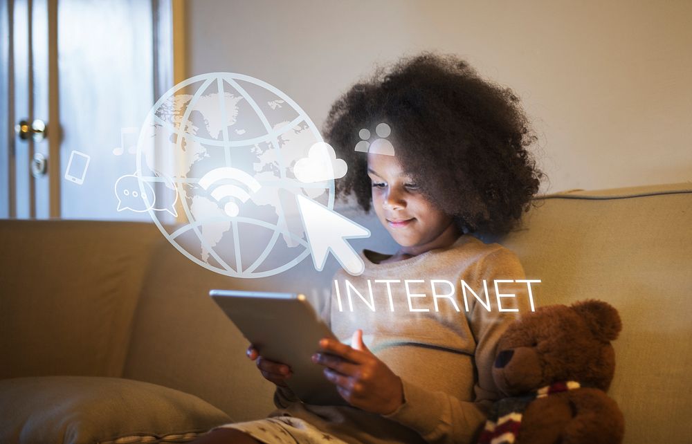 Young black girl using a digital tablet