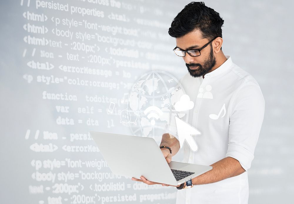 Indian software engineer working on his laptop