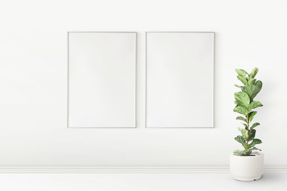 Picture frame mockup psd hanging in a minimal living room