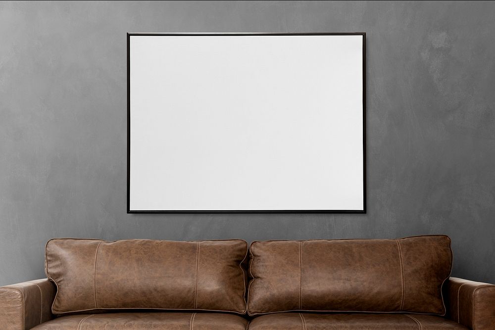 Picture frame mockup psd hanging in a loft living room