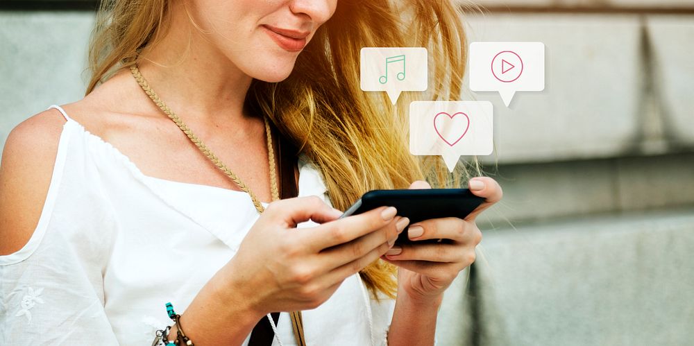 Blond woman watching an online video clip