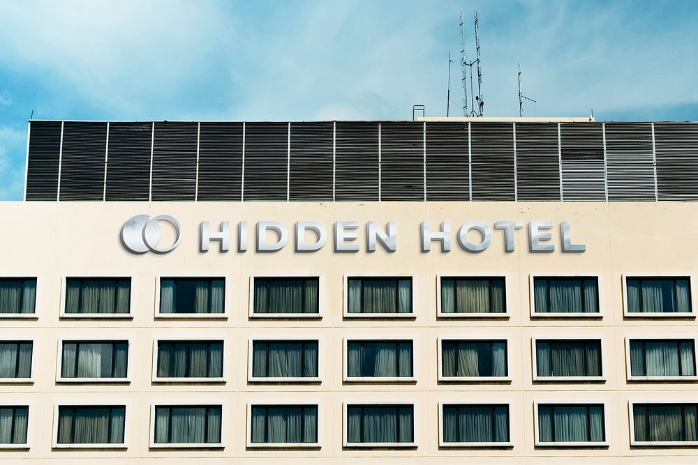 Hotel building logo mockup, silver psd design