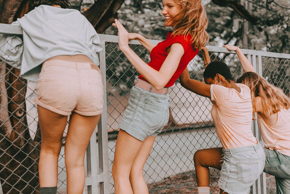 Summer friendship aesthetic, teenage girls hanging out in a park