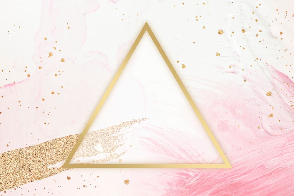 Gold triangle frame on a pink background