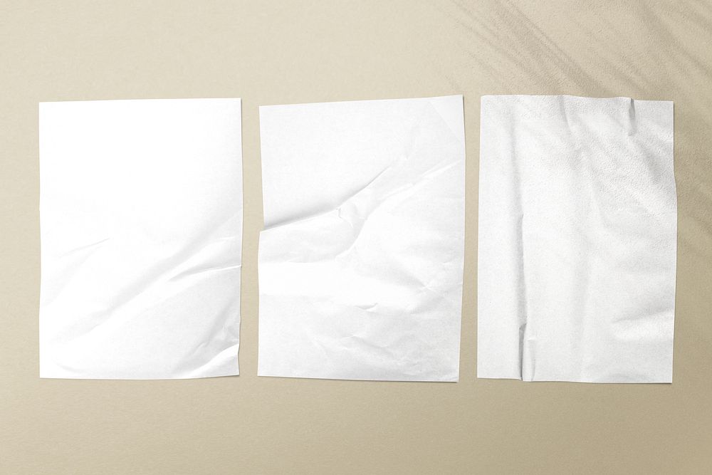 White crinkled paper on beige background