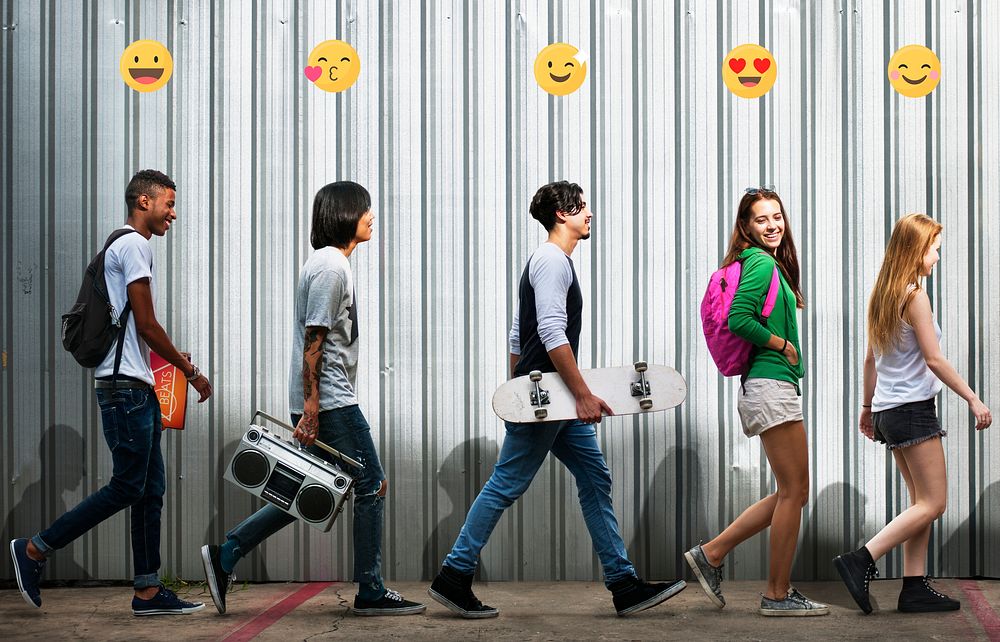 Teenagers with emoticons hanging out