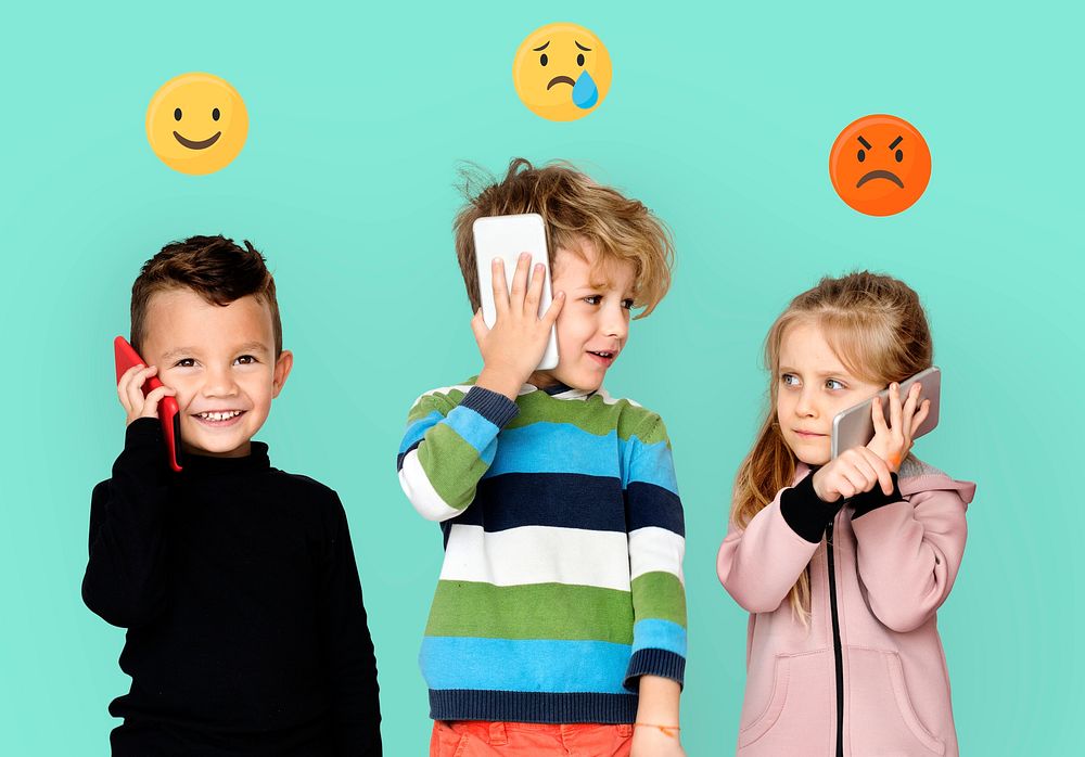 Children with emoticons talking on mobile phones
