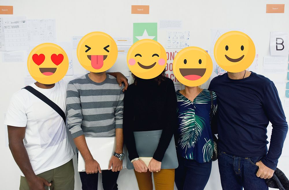 Diverse friends with positive emoticons