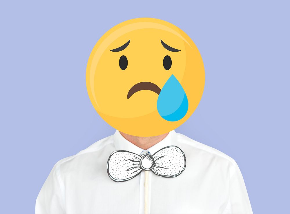Sad face emoji portrait on a man