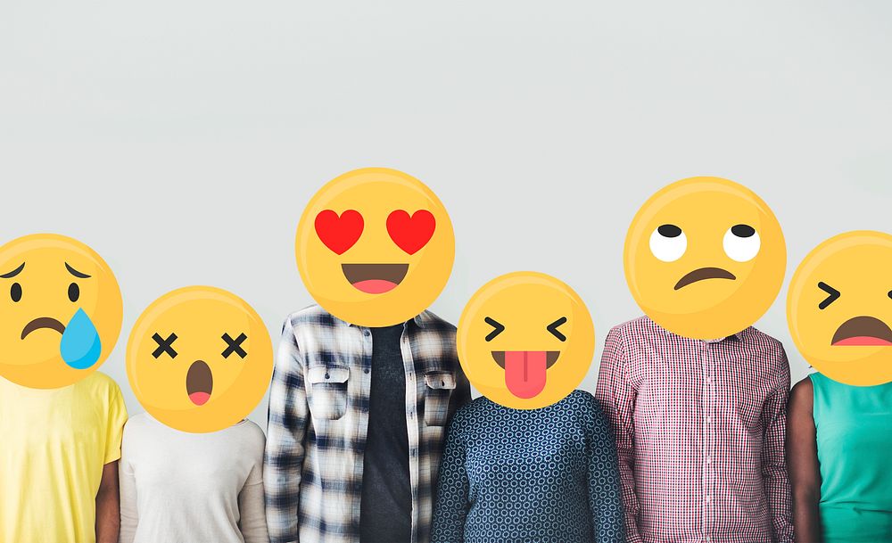 Diverse friends covered with emoticons
