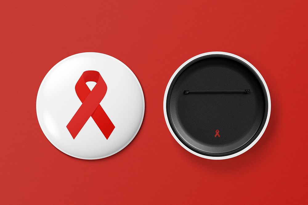 HIV awareness pin badge, red ribbon graphic