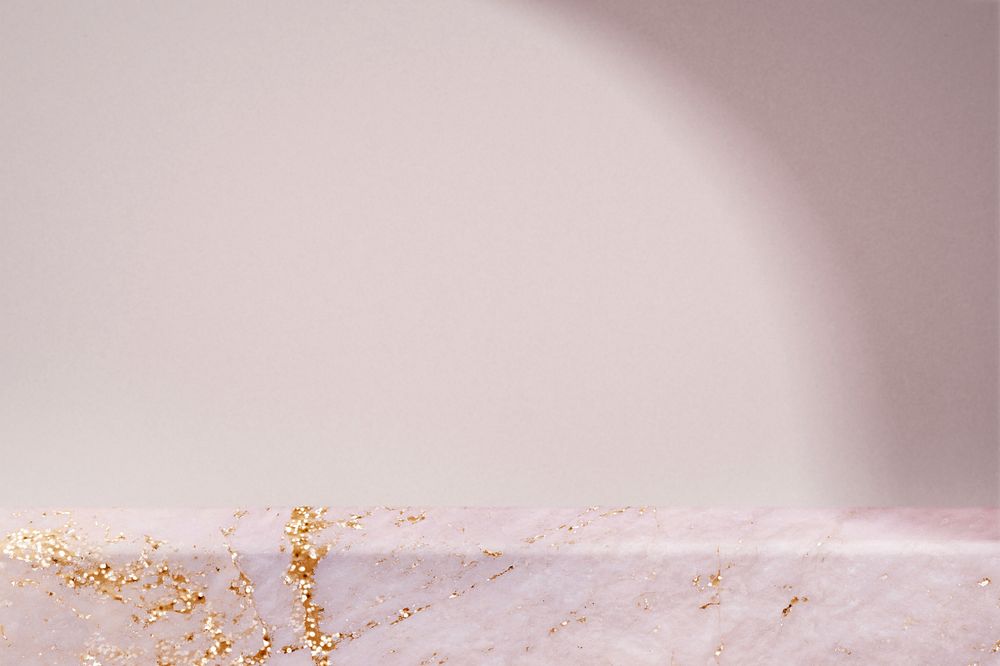 Aesthetic pink marble product backdrop, luxury gold design with natural light