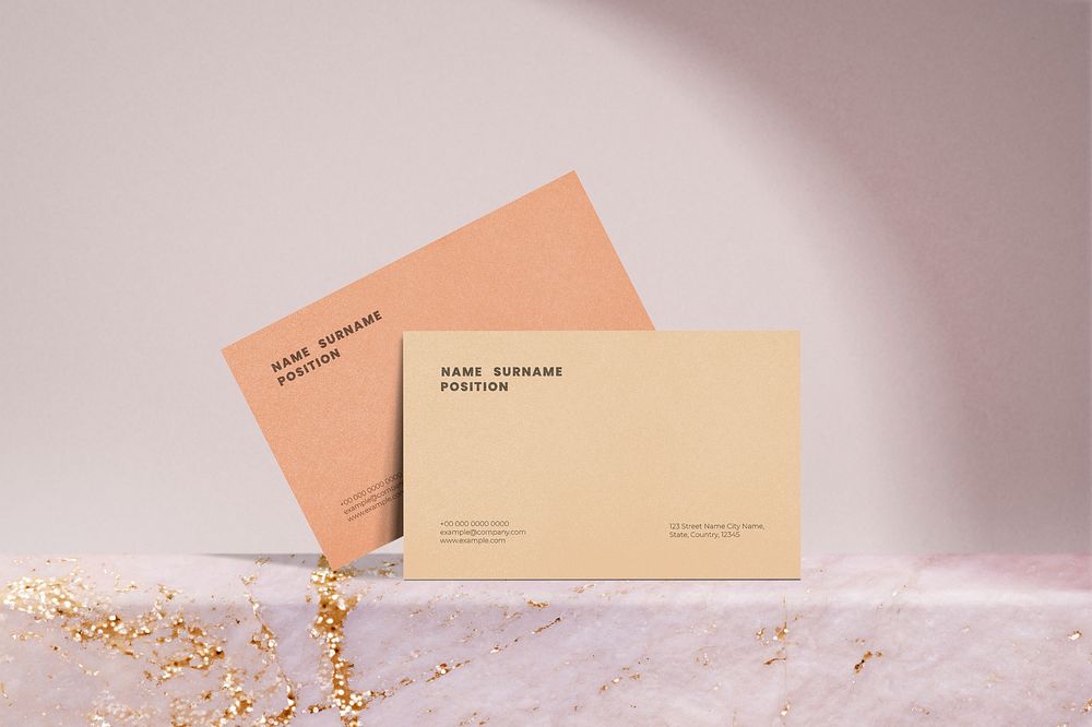 Orange business card mockups, branding design, pink marble product backdrop psd
