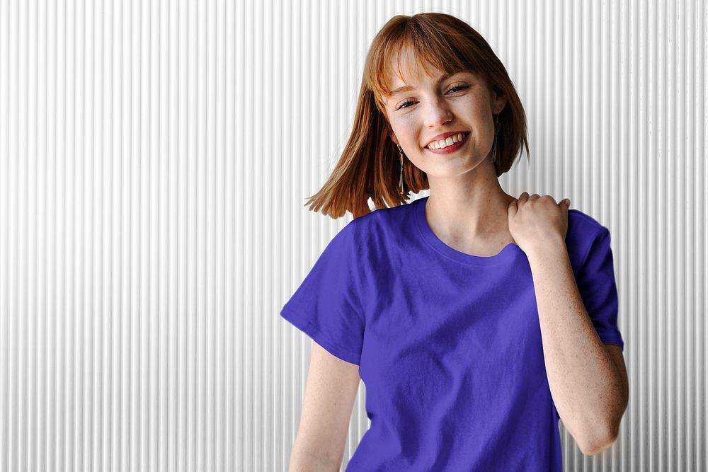 Woman in purple shirt smiling, International Women&rsquo;s Day