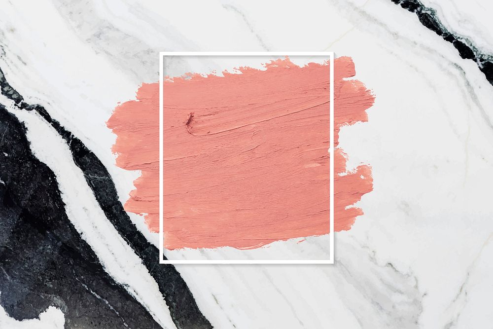 Matte orange paint with a white rectangle frame on a gray marble background
