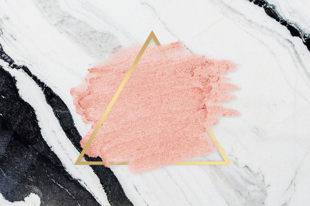 Pastel pink paint with a gold triangle frame on a white marble background illustration