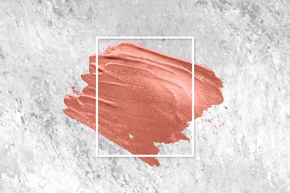 Metallic orange paint with a white frame on a grunge concrete background