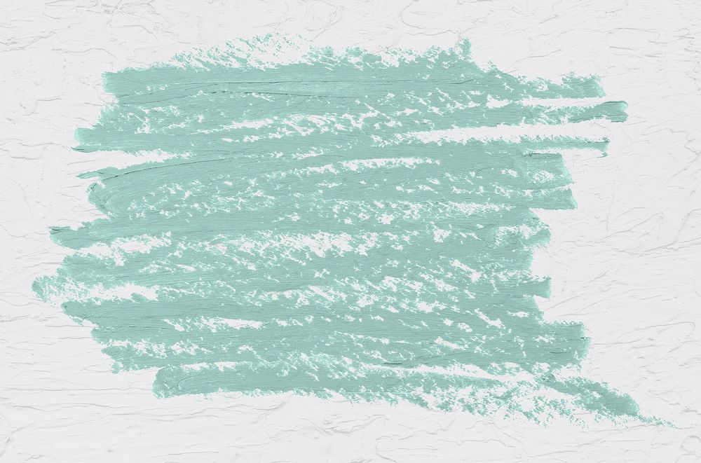 Mint green oil paint brush stroke texture on a white paint textured background