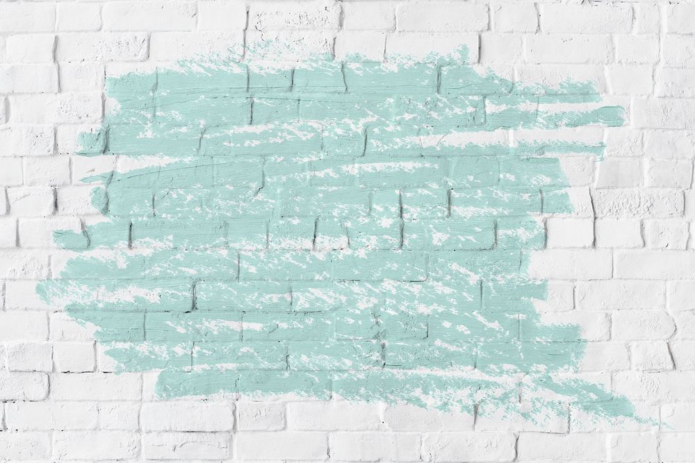 Mint green oil paint texture on a white brick wall
