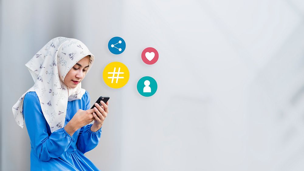 Muslim girl using her smartphone