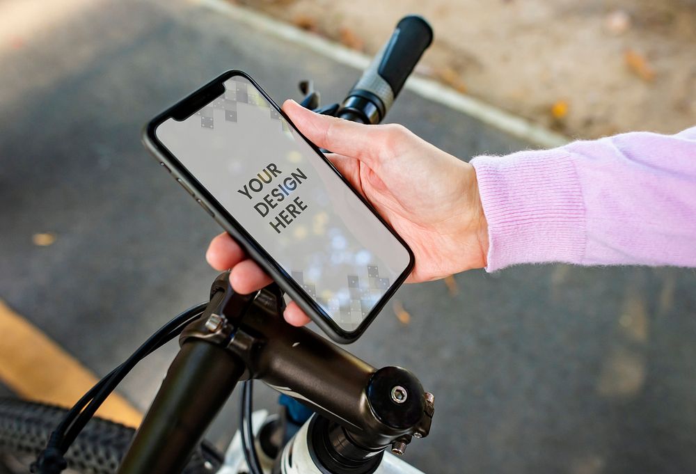 Cyclist using a mobile phone mockup