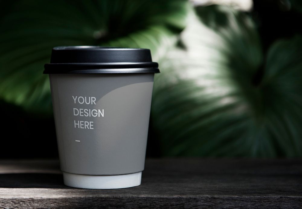 Coffee cup mockup on a table