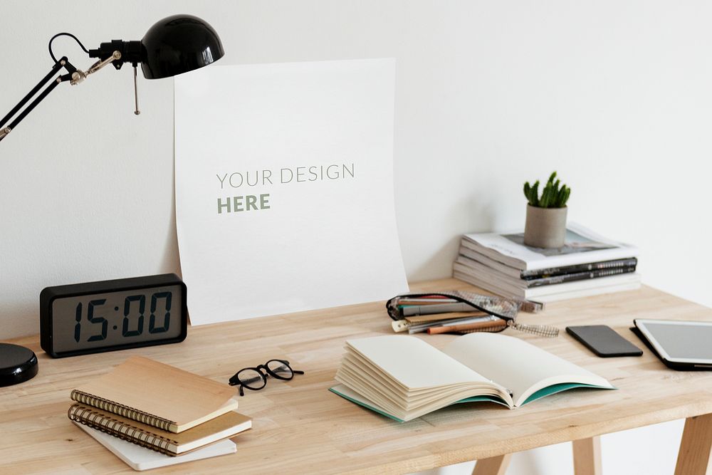 Paper mockup on a desk with stationery