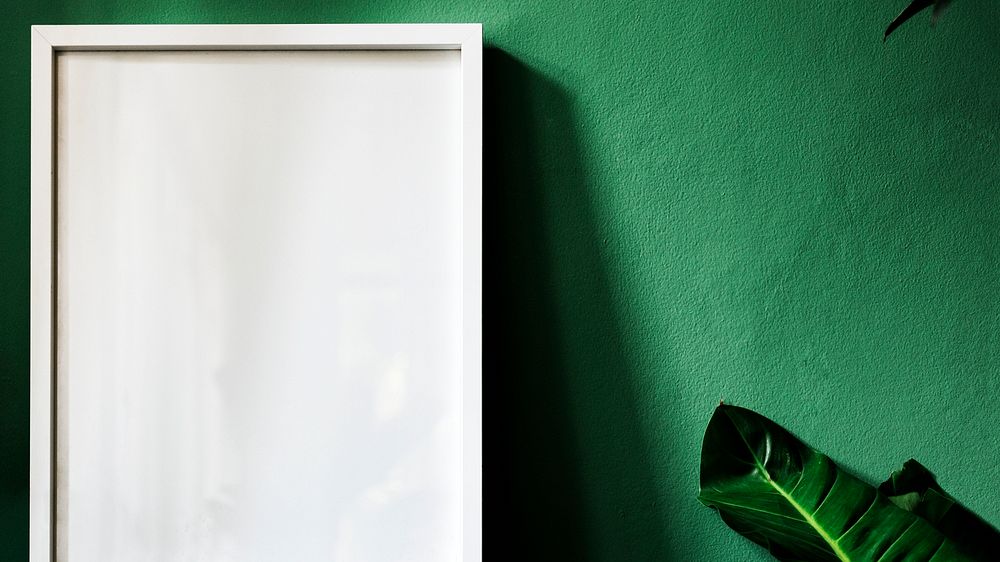 Frame mockup with a green wall website banner template