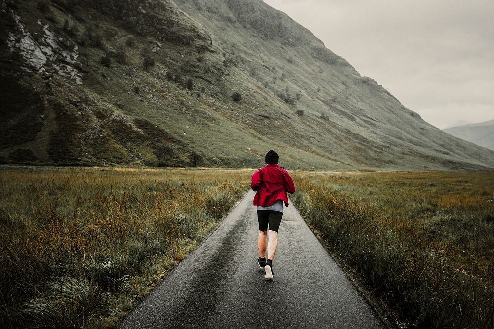 Man jogging through the Highlands