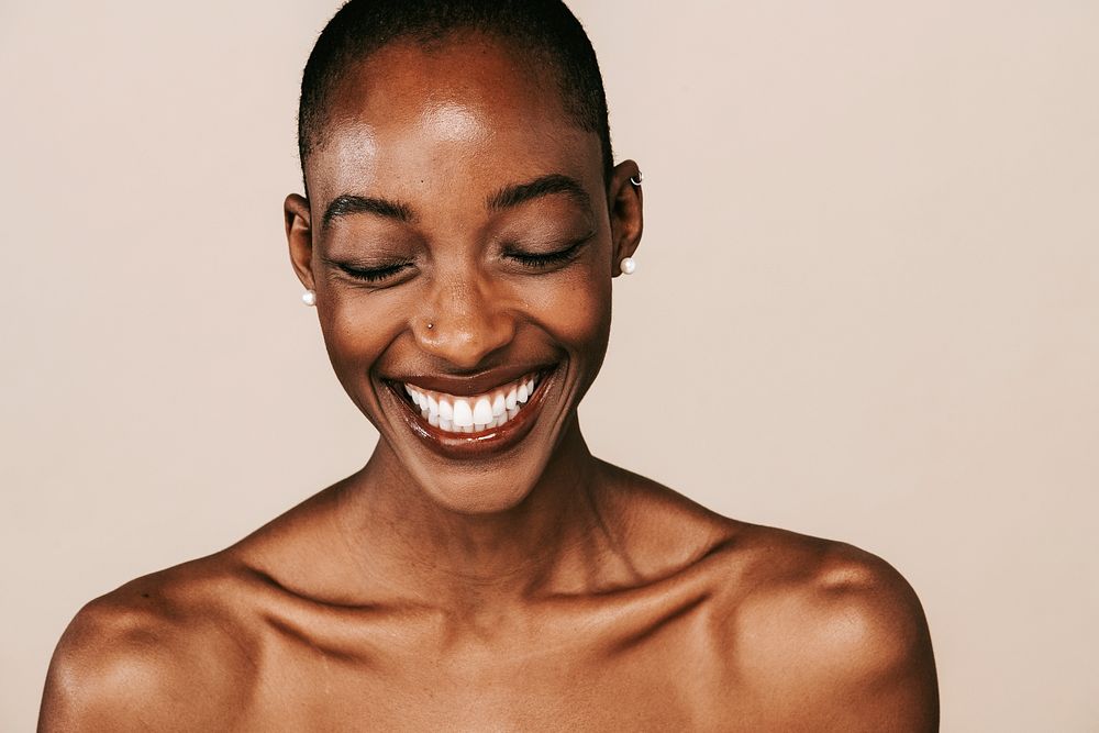 Happy nude black woman portrait