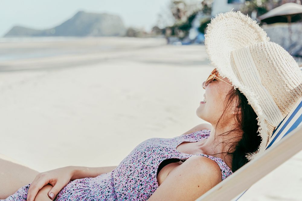 Asian woman relaxing at the beach