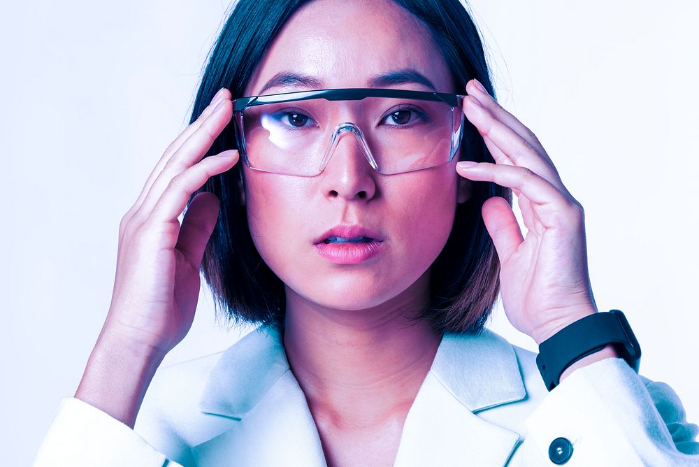 Asian scientist with protective goggles